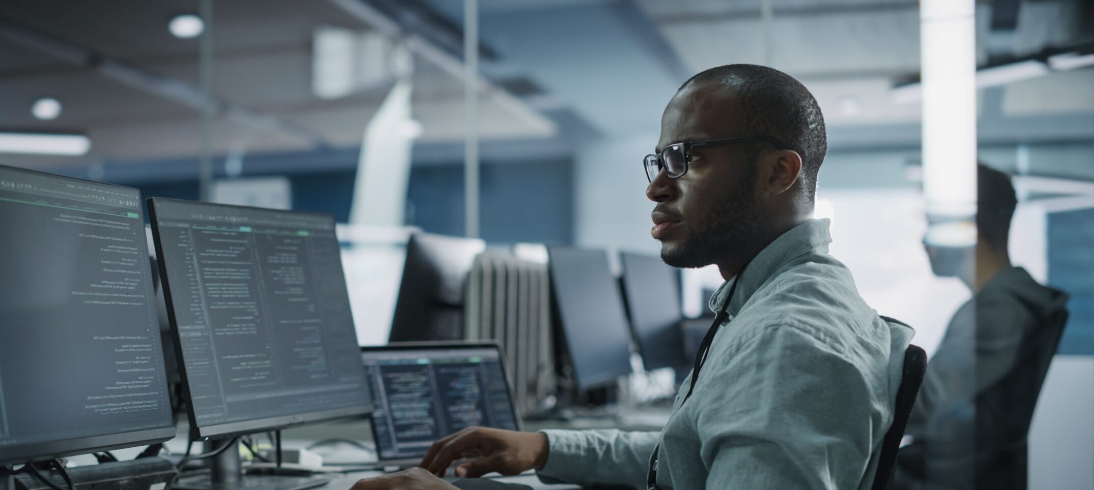 Authentic,Office:,Professional,Black,It,Programmer,Working,On,Desktop,Computer.